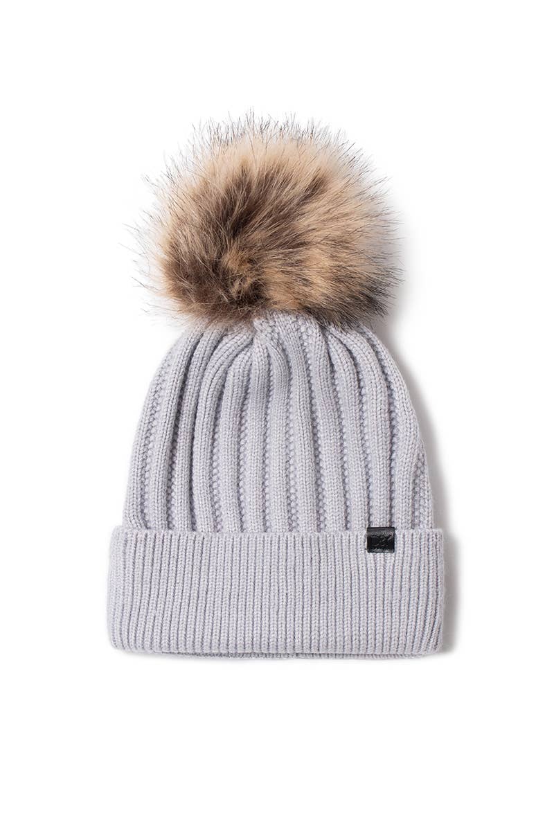 Knit beanie with faux fur pom pom